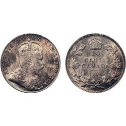 1906. Both ICCS and PCGS graded Mint State-65. Rich, iridescent blue-purple toning with red highligh