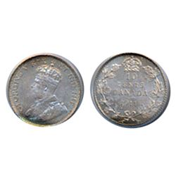 1911. PCGS graded Mint State-66. Light rainbow toning. A Gem with great ‘eye appeal’.