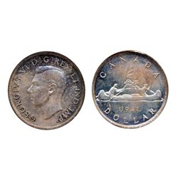1947. Maple Leaf. Single ‘H.P.’ variety. PCGS graded Mint State-64. Lightly toned in shades of blue