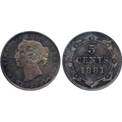 1881. PCGS graded Mint State-65. A Gem, with attractive medium heavy, multi-hued rainbow toning. Exc