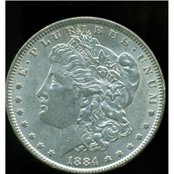 1884 MORGAN SILVER DOLLAR AU