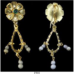 Ornate gold, pearl and emerald earring.