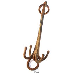 Hand-forged iron grappling hook, 1700s, found in Virginia.