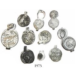 Lot of 9 small lead cloth-bale seals (1500s-1600s).