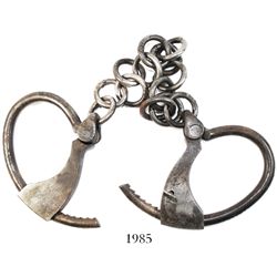 Iron leg-irons (shackles), naval/military, ca. 1860-1880, with original key.