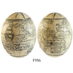 Large ostrich egg with (modern) scrimshaw showing two voyages with locations of whales caught in the