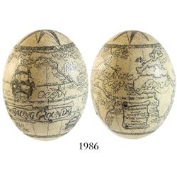 Large ostrich egg with (modern) scrimshaw showing two voyages with locations of whales caught in the