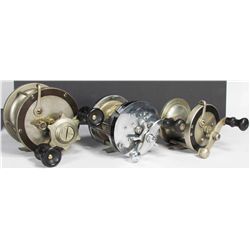 Three Pflueger Fishing Reels