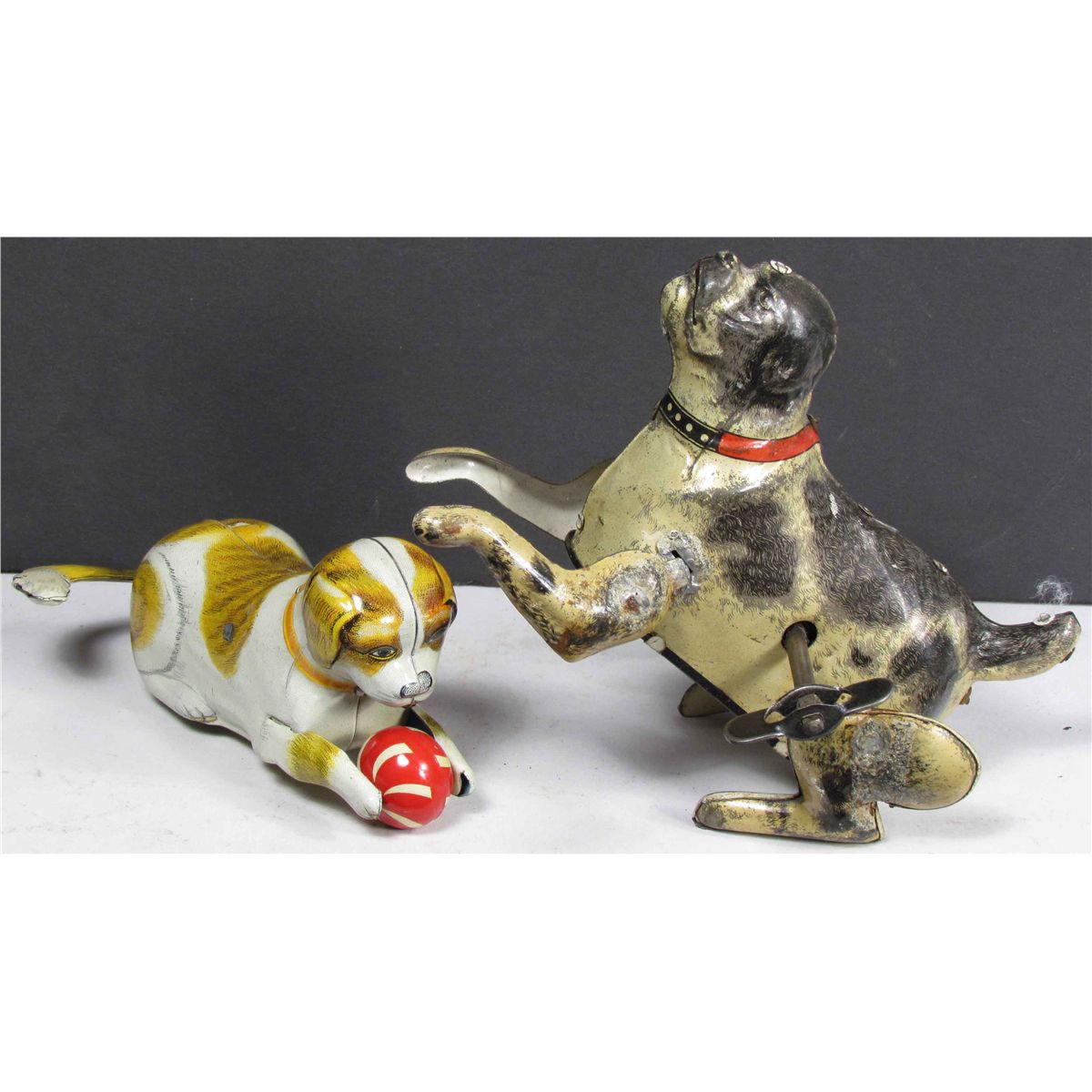 Two Tin Dog Mechanical Toys