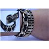 Image 1 : BLACK LEATHER AND YELLOW BRASS DOUBLED BRACELET
