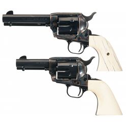 Two Colt Revolvers with Ivory Grips