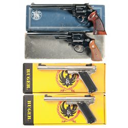 Four Boxed Handguns