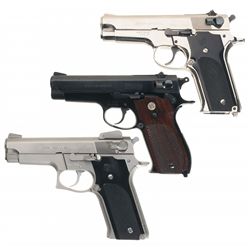 Three Smith & Wesson Double Action Pistols