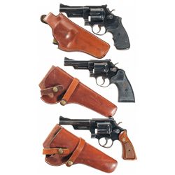 Three Smith & Wesson Double Action Revolvers with Holsters