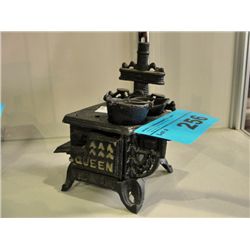 Cast metal queen toy stove