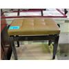 Adjustable height tan leather padded piano bench