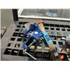 Image 1 : Small bench vice and a hatchet