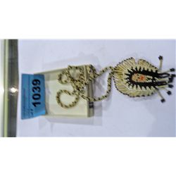 Beaded necklace and pendant