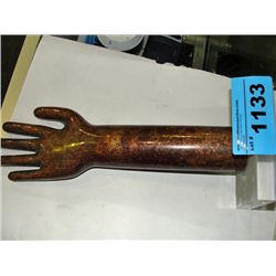 Switzer bronze hand symbolizing wealth and