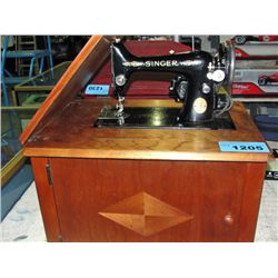 Vintage singer sewing machine with walnut cabinet