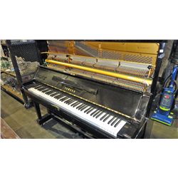 Black laquer finish yamaha steel back piano