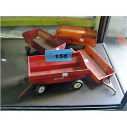 Lot of 4 vintage tin toy tractor trailers