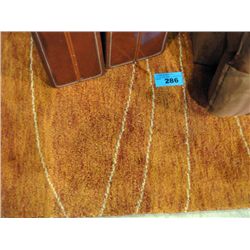 Orange wool area rug