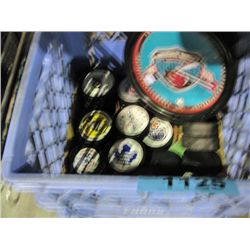 Milk crate of assorted NHL team pucks and a