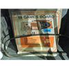 Image 1 : 2 vintage games boards and a packard automobile
