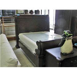 Queen size mahogany finish bed;