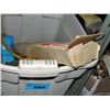 Image 1 : Beige plastic storage container filled with tools