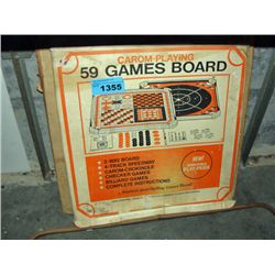 2 vintage game boards and a vintage packard