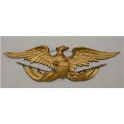 Cast iron American Eagle with spread wings  over flags and union shield, approx. 27” wide  and appro