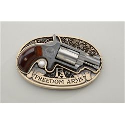 Diminutive Freedom Arms spur trigger  revolver, .22LR cal., 1-1/2” barrel,  stainless steel, wood gr