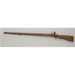 Italian Legitimo flintlock rifle, .70 cal.,  #872 in overall good condition with scattered  storage 