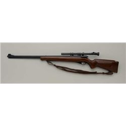 Mossberg 146B .22 Cal. Semi auto rifle with  scope. Good to very good condition. Est.  $75-$150.