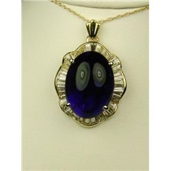 Exquisite 14 karat heavy yellow gold ladies  necklace set with a fine cabochon Amethyst  weighing ap