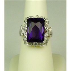 Exquisite 14 karat white gold ladies designer  inspired ring set with a fine checkerboard  cut Ameth