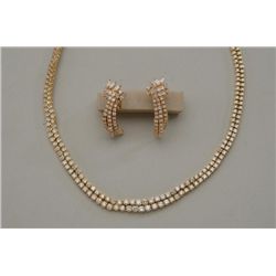 Stunning and important ladies custom diamond  necklace with matching drop earrings.  Approximately 1