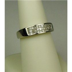 Dazzling 14 karat white gold ladies  anniversary design ring invisible set with 36  princess cut dia