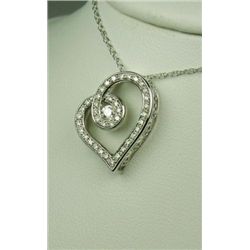 Intricate14 karat white gold ladies heart  design necklace fine set with 39 round  diamonds weighing