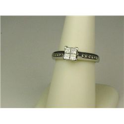 Brilliant ladies Platinum ring invisible set  with 4 princess cut diamonds and 10 channel  set diamo
