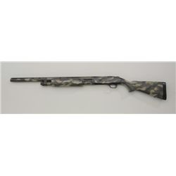 Mossberg Model 835 pump action shotgun, 12  gauge, 24” ported barrel, camo finish to  metal and stoc