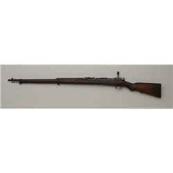 Japanese Arisaka bolt action rifle, 7mm cal.,  32” barrel, ground mum, military finish,  wood stock,