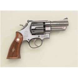 Smith & Wesson Model 27-2 DA revolver, .357  Magnum cal., 3-1/2” barrel, blue finish,  checkered woo