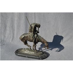 Bronze casting signed  JE Fraser entitled”  End of the trail” approximately 16 ½ inches  in height b