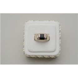 One gents ring set with a square black onyx  and diamonds Gold wt 10.5gm.  Est.:$500-$1,000.