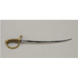 Diminutive saber, approx. 9-1/2” overall with  an approx. 7-1/2” blade, brass grip and  guard in ove