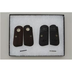 Lot of 2 pair of grips for the Colt pocket  semi-auto pistol, one pair the checkered  black hard rub