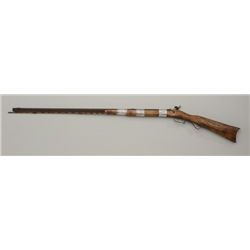 Half stock percussion plains rifle with  interesting pierced iron patchbox and iron  mounts. The tan